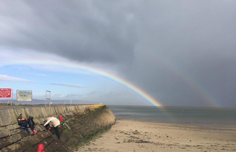 A rainbow by the sea